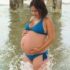 Img embarazo ropa embarazada playa verano biquini banador listado